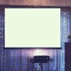 A projector screen for showing a slideshow.