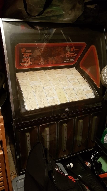 The front of a vintage jukebox.