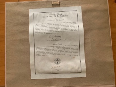 A certificate of authenticity for a Thomas Kincade print.