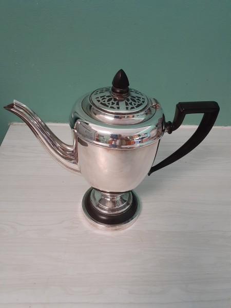 Determining Silver Plate vs. Sterling Silver - silver teapot with black handle and lid knob