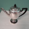 Determining Silver Plate vs. Sterling Silver - silver teapot with black handle and lid knob