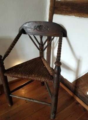 Identifying an Antique 3 Legged Chair - carved and turned three legged chair with rush covered seat