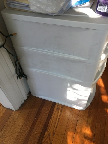 Source of Black Soot Sticking to All Plastic Items in Apartment