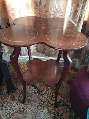 Identifying an Antique Table - a unique four legged two tier table, the top of which is four lobed