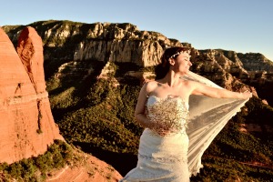 A bride with the Arizona cliffs in the background.