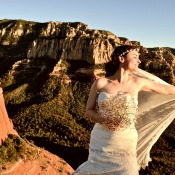A bride with the Arizona cliffs in the background.