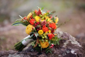 An orange and yellow wedding bouquet, perfect for fall.