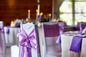 Decorated chairs at a wedding.