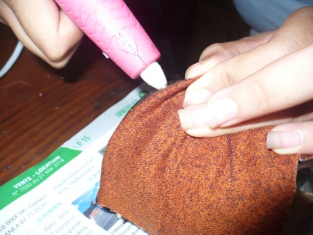 Decorative Fabric Covered Glass Canisters - continue around the top and bottom of the jar, fold the vertical end under and glue in place to finish
