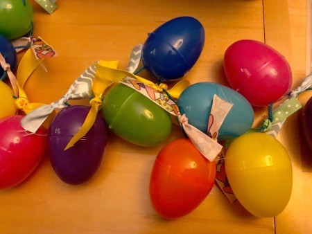 Making a Plastic Egg Garland - more ribbons tied on