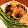 Crispy Lemon Rosemary Chicken on plate with noodles & asparagus