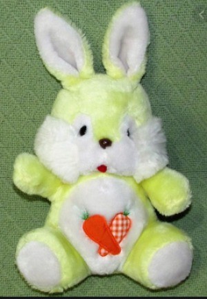 Value of a Vintage Stuffed Bunny Toy - yellow and white stuffed bunny toy with fabric carrots on its belly