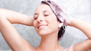 A woman washing her hair.