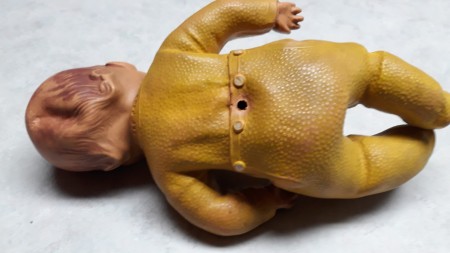 Rubber on a Vintage Doll Is Breaking Down