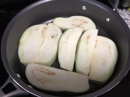 frying eggplant in pan