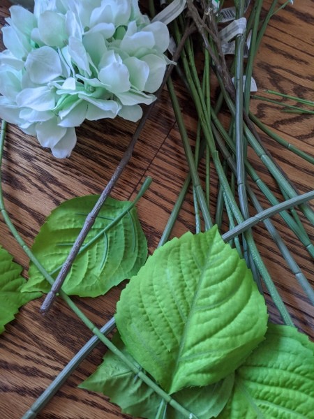 Making a Hydrangea Door Wreath - leaves, stems, and flower