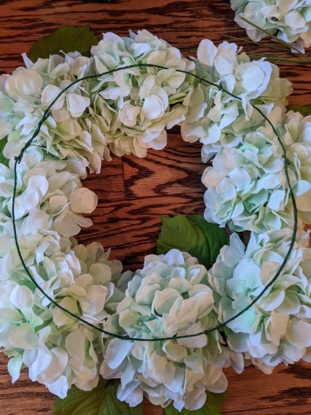 Making a Hydrangea Door Wreath - wire wrapping wire circle,  attach flowers with floral wire