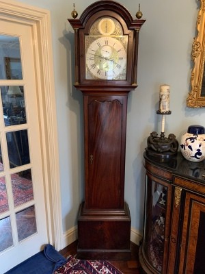 Value of a Grandfather Clock - clock in a corner of the room