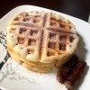 Maple Sausage with Stuffed Waffles sprinkled with powdered sugar