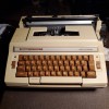 Repairing a Smith Corona Deville Electric Typewriter - tan typewriter