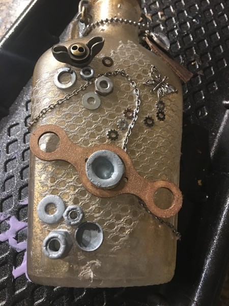 Steampunk Bottle - glue items to front and back of bottle, leaving out those you don't want painted