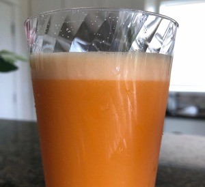 Glass of Turmeric Ginger Orange Carrot Juice