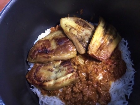 Eggplant on meat on rice
