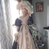 Value of a Cathy Collection Doll  - doll wearing a long period dress with large matching hat