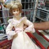 Value of Danbury Mint Porcelain Dolls - doll in long Victorian style dress with ruffle at shoulders and around sleeves and bottom
