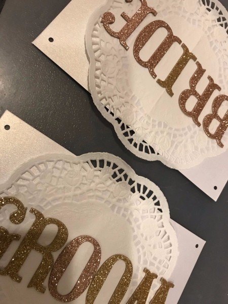 Bride and Groom Wedding Chair Signs - punch holes in the top corners