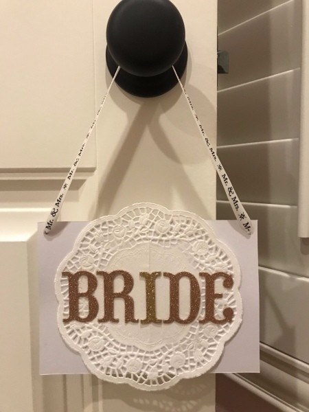 Bride and Groom Wedding Chair Signs - bride sign on a door knob