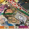 A Monopoly board game with the pieces saved in sandwich bags.