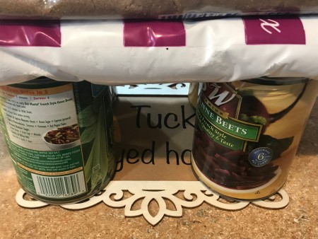 Felt Carrot Garland and Paper Carrot Sign - weighing down the frame and sign