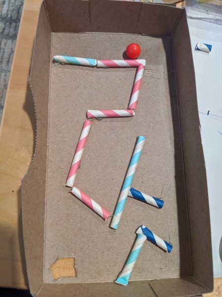 DIY Tissue Box Marble Maze - cut a small hole for the marble to fall through at the end of the maze