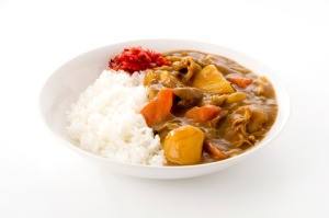A plate of curry and rice.