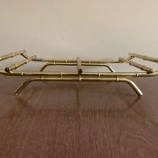 Identifying a Goodwill Find - brass curved rack with legs