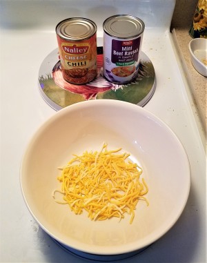 Shredded cheese in a bowl.