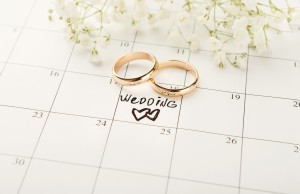 Two wedding rings on a calendar.