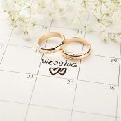 Two wedding rings on a calendar.
