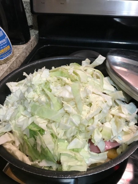 chopped cabbage on dinner in skillet