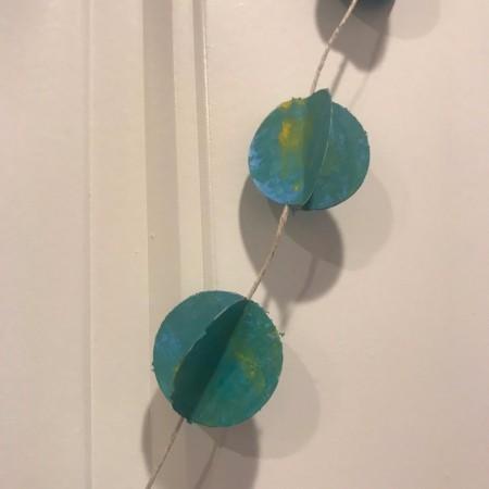 Splatter Paint Sticker Circle Garland - length of twine with two sticker balls visible
