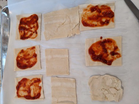 puff pastry cut in pieces with pasta sauce
