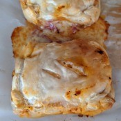 Mini Pizza Calzone on baking sheets