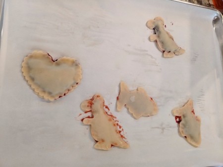 pie dough shapes on top of jamBerry Hand Pies