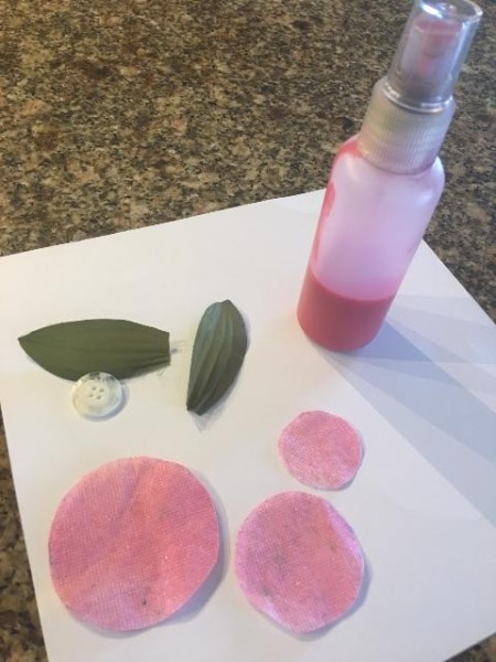 Making a Journal with a Jeans Pocket - coloring the dryer sheet circles, mist bottle, leaves, and button above the circles