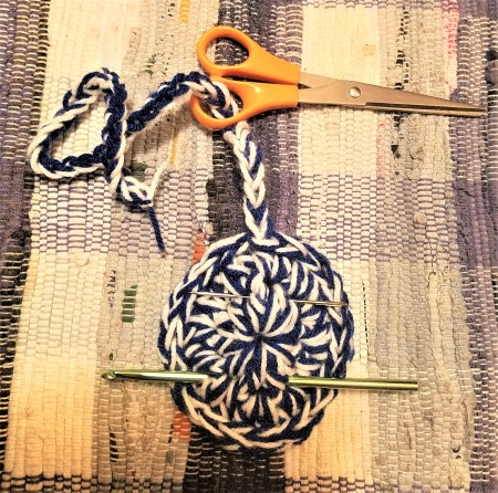 Crochet Buddy for Hook and Needle - hook though the circle and mini scissors with chain through the handle
