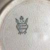 A maker's mark on the back of Saxon china.