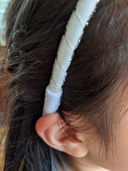 Felt Crown Headband - child wearing the headband with the felt on ends