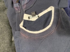 Shirt Collars and Plackets Fading - faded area around the neck band on a blue tee-shirt