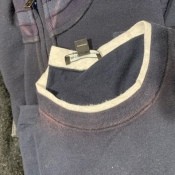 Shirt Collars and Plackets Fading - faded area around the neck band on a blue tee-shirt